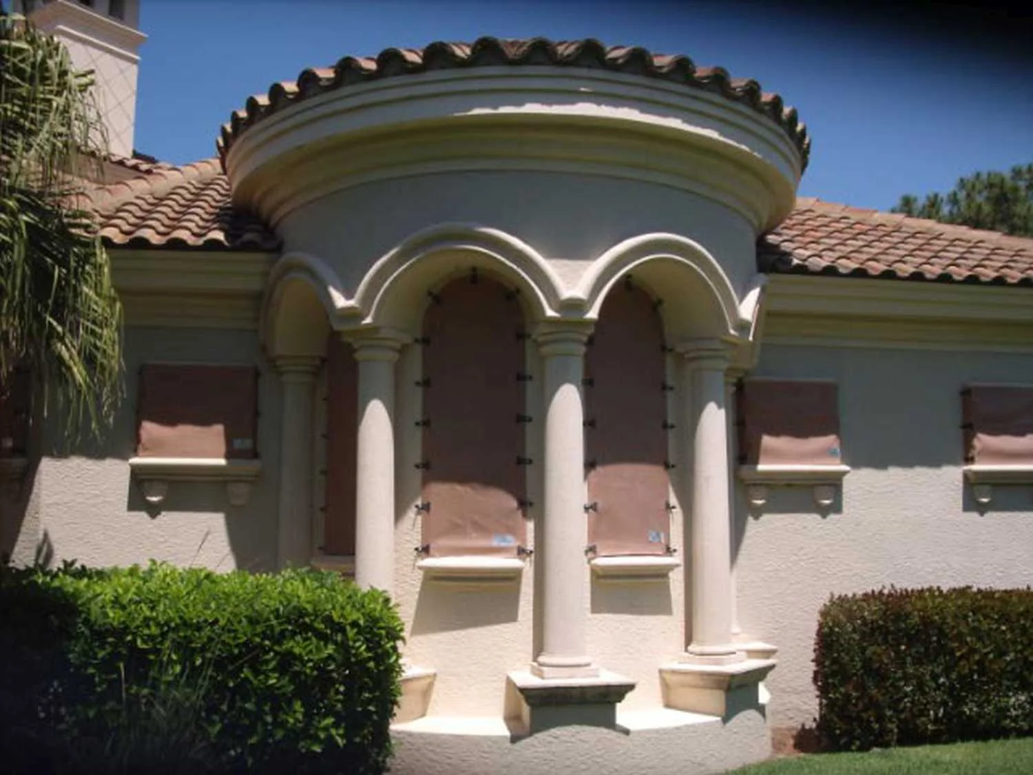 AstroGuard fabric screens for arched window openings — hurricane protection Los Cabos
