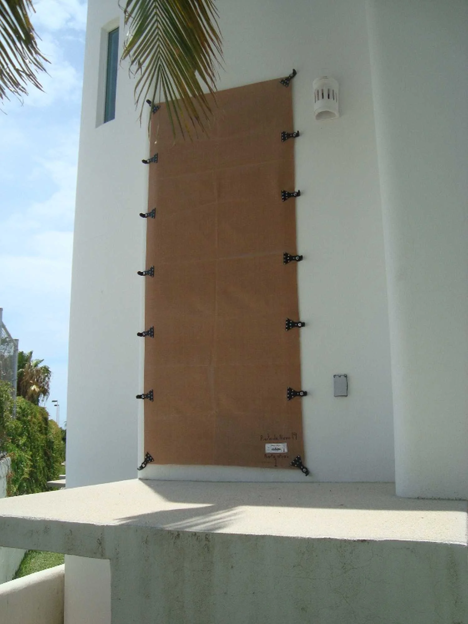 Hurricane fabric protection for Baja California villa windows and sliding doors